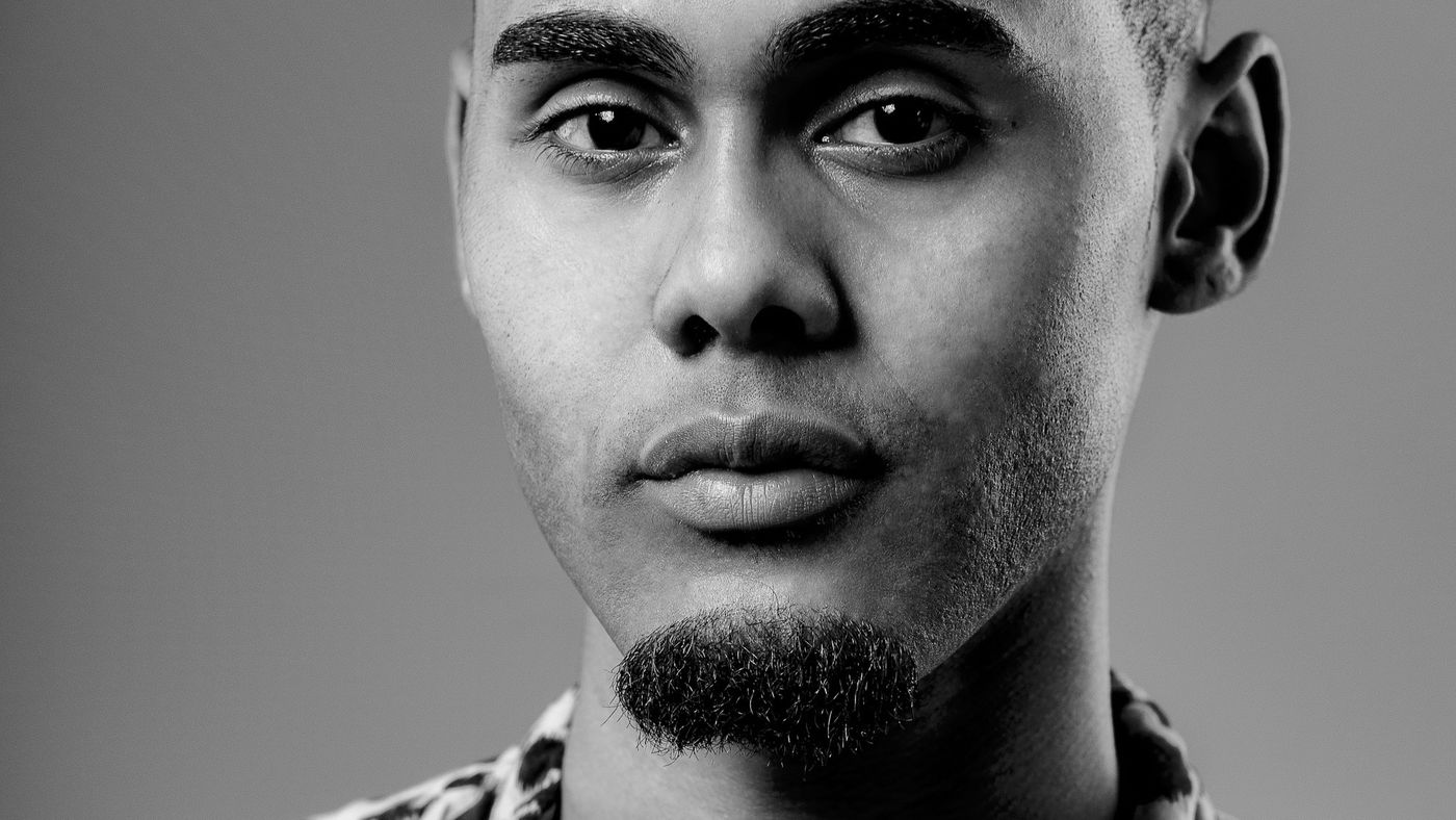 Portrait of a man with short, textured hair